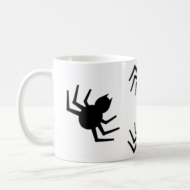 En svart spindel Mugg (Vänster)