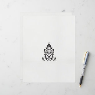 en svartvit bild av en ornerad design