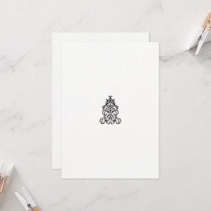 en svartvit bild av en ornerad design inbjudningar