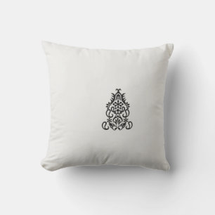 en svartvit bild av en ornerad design kudde
