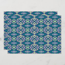 En symmetrisk mönster av blå motiv på en textilvar tack kort