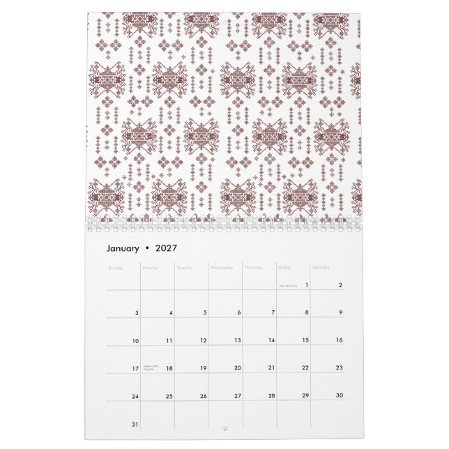 En symmetrisk vit omslutning papper med ett rep kalender (Jan 2027)