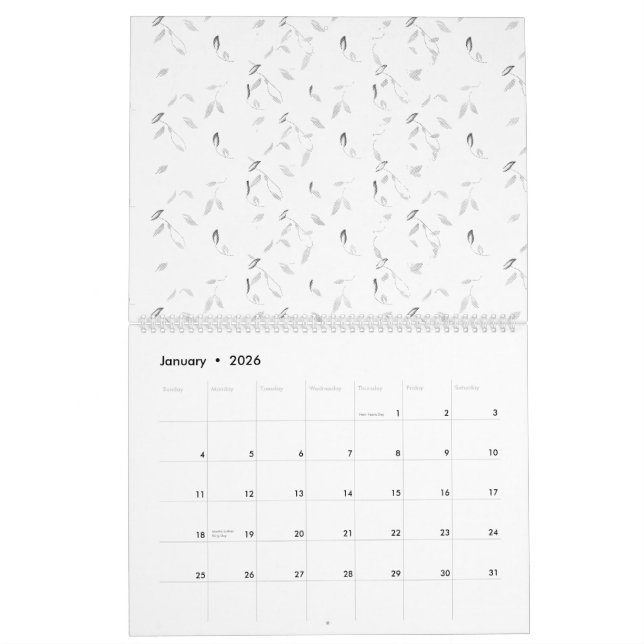 En syntilltalande arrangemang av vitt och grått kalender (Jan 2026)
