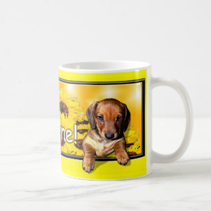 En taxmugg med ett stort "morninsolsken ", kaffemugg