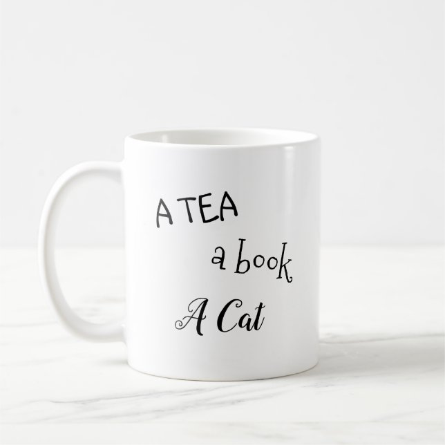 "En tea, en bok, mugg för en katt" (Vänster)