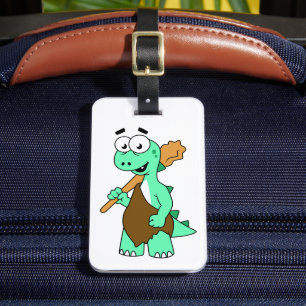 En Tecknad Tyrannosaurus Rex-Grottman. Bagagebricka