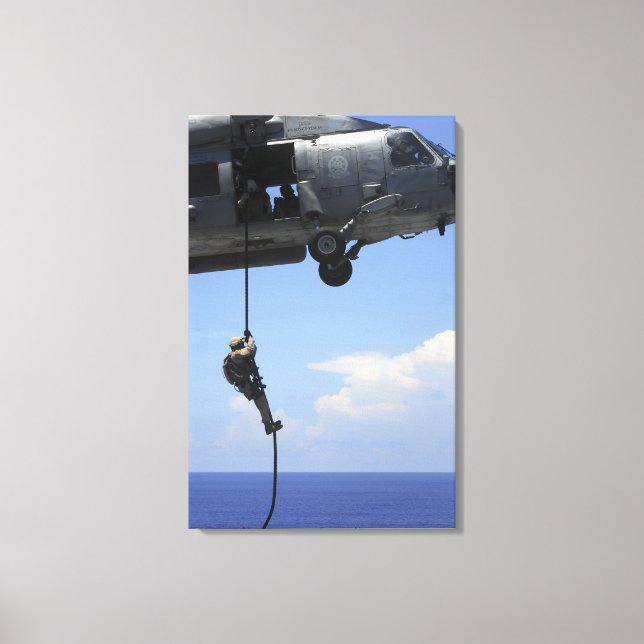 En tekniker för hantering av sprängämnesproppar canvastryck (Framsida)