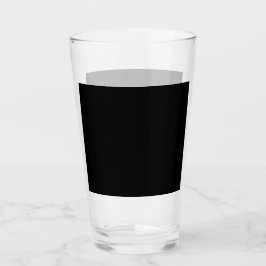 En texturerad svart yta med subtilt kornmönster glaskopp