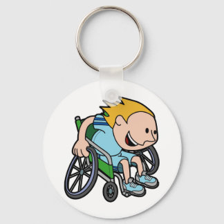 En ung pojke tävla i en rullstol nyckelring