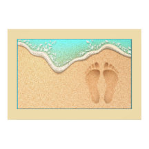 En uppsättning fotavtryck i Sand