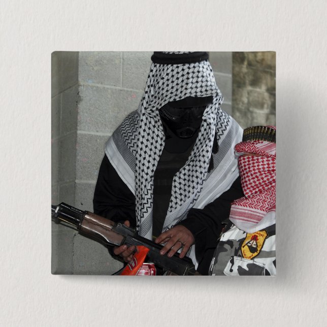 En uppspelande fiendeangripare arm a dummy knapp (Framsida)