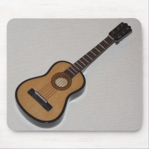 En vacker akustisk miniatyr, guitar-mussla musmatta
