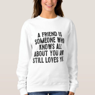 En vän är någon som vet allt om dig och st t shirt