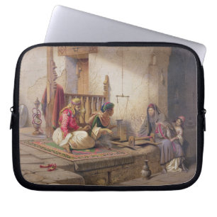 En vävare i Esna, en av 24 producerade Laptop Sleeve