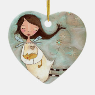 En vinge och en spinnande julgransprydnad keramik