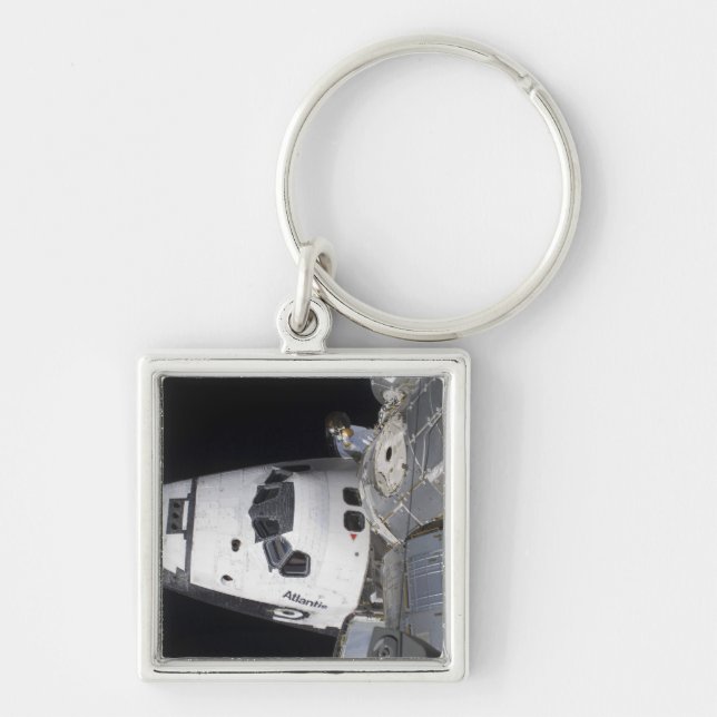 En vinkel syn på besättningskabinen fyrkantig silverfärgad nyckelring (Framsidan)