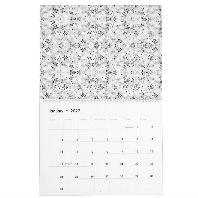 En visuellt slående vit och svart mönstrad vägg kalender (Jan 2027)