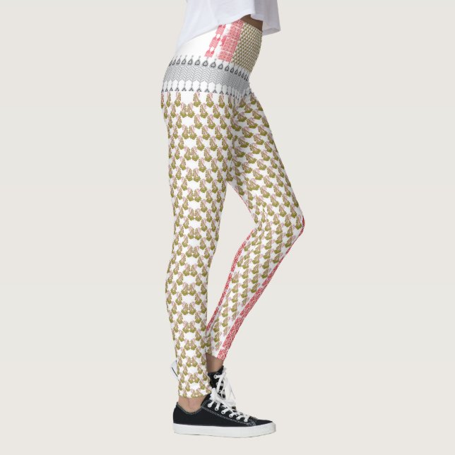 en vit bakgrund med grönt löv på den leggings (Höger)