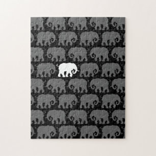 En vitelefant i en flock pussel