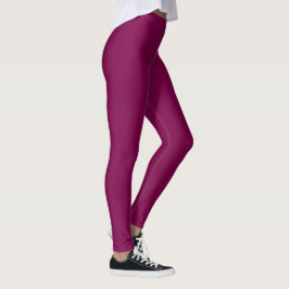 Enhetlig vinröd bakgrund med en slät textur leggings