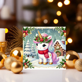 Enhörning vid en festlig vinterstuga julkort