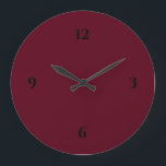 Enkel Burgundy Vin & Black Stor Klocka<br><div class="desc">Modern klocka har en minimalistisk design i en burgundisk palett med svart accent i färg. En enkel design med svarta siffror på en burgundisk färgad i vin. Ett trendig till ditt kök, vardagsrum eller kontorsvägg, en tänkbar modern kontorsgåva eller en modern hemgåva till vilken tillfälle som helst. Du kan anpassa...</div>