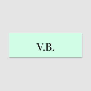 Enkel enfärgad text monogram namnbricka