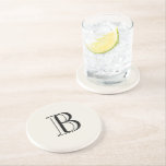 Enkel Kräm & Svart Monogram Kräm  Underlägg<br><div class="desc">Kräm och svart Monogram  Krämfärgad stenkopp.  Monogrampresent.</div>