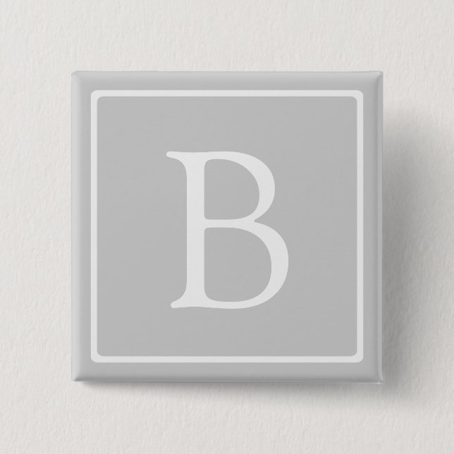 Enkel ljusgrå monogram knapp (Framsida)