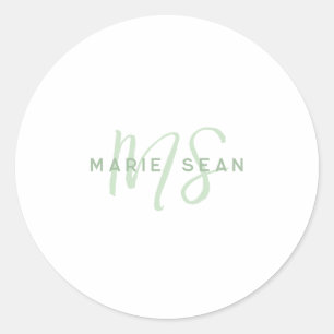 Enkel minimalistisk monogram i salvia grön runt klistermärke