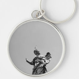 Enkel, modern bild av fiskmås ovanpå statyn rund silverfärgad nyckelring