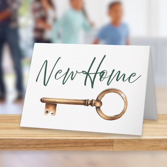 Enkel Snyggt Nyckel Modern ny hemmet Kort (A stylish card with 'New Home' words in elegant script typography and a classic door key picture)