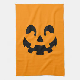 Enkel svart pumpa ansikte på orange Halloween Kökshandduk