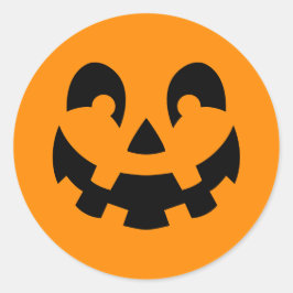 Enkel svart pumpa ansikte på orange Halloween Runt Klistermärke