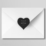 Enkel svartbröllopsförmån för minimalistisk elegan hjärtformat klistermärke<br><div class="desc">Elegant: minimal svartvit bröllopsformad presenthjärtformdekalk med ett kalligrafiskt skript för klassfärgat snyggt chic trendig. Enkel att anpassa med dina uppgifter! Lämpligt för temat bröllop för formell neutralt. Observera att bakgrunden till färg kan ändras för att matcha bröllop-färg-schemat. Om det känns bekvämt att göra det kan du ändra det efter att...</div>