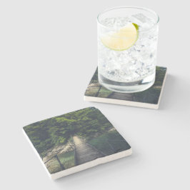 Enkel upphängningsbro över floden Idrijca, Slove Stenunderlägg