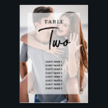 Enkelt 2 fotopatöverlägg, sittdiagram för Bröllop Bordsnummer<br><div class="desc">En enkel elegant 2-fotoöverlägg av bröllop-design. Denna moderna contemporary är perfekt för alla årstider på bröllop mellan Vår, sommar, höst och vinter. En variellum-snyggt ser övertäckt ut med svart kalligrafi-typografi. Ett klasssäkert bordsnummer i elegant bröllop med modernt enkelt inslag. Det finns även alternativ för matchning av bröllop-kontorsartiklar och andra bröllopsinbjudningsformat....</div>