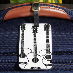Enkla akustiska gitarrer bagagebricka