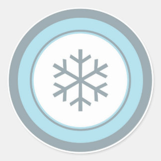 Enkla blåa grått-cirkel, snöflingor runt klistermärke