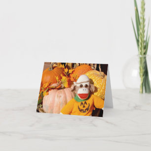 Ernie sock monkeypumpan noterar kortet kort