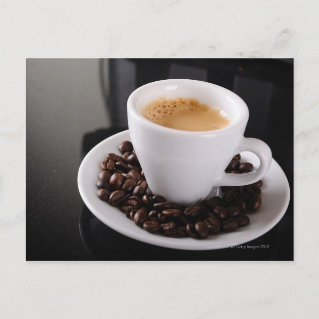 Espresso cup on black granite counter vykort (Framsida)