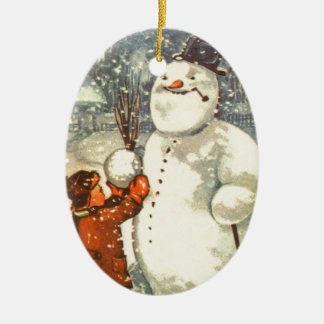 Estländsk pojke med snögubbejulgranprydnaden julgransprydnad keramik