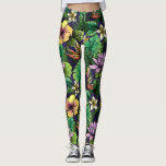 Etched Tropical Flower Mönster Gult Rosa Black Leggings<br><div class="desc">Sparka tillbaka i dessa roligtar som innehåller mönster av hibiscus-blommor,  fåglar från paradiset och handflatan-ferns. Perfekt för ett speciellt evenemang,  workout på gymmet,  tropisk semester eller festival.</div>