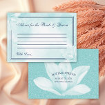 Etheral Crystal Blue Magnolia, Bröllop Rådkort<br><div class="desc">Bröllop Advice Card med delikat kristallblått magnolia-blomma över abstraktens blommigt i samma färgton tillsammans med titeln "Råd för briden och groom" i ett kalligrafiskt skript för elegant, omgivet av två tunna gräns. På baksidan finns namn, datum, stad och stat över en faux glitter-bakgrund och en kristallblå magnolia (som du vill...</div>