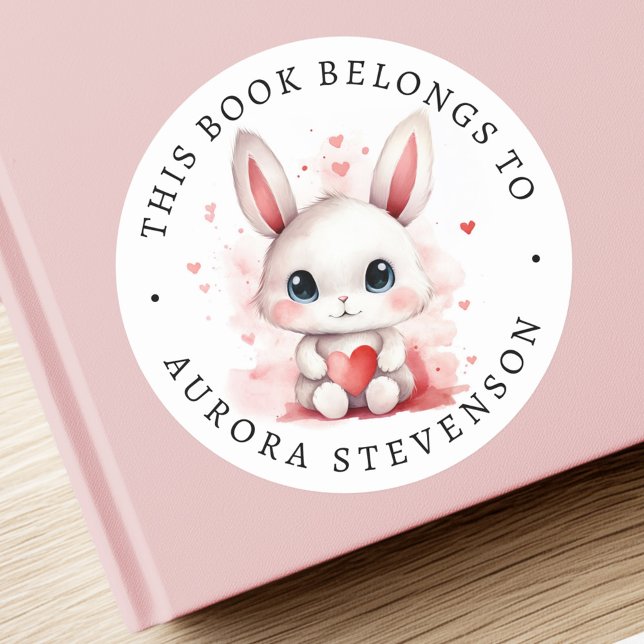 Etikett för att hålla i bibliotek bok (Cute bunny holding heart library book label)