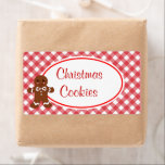 Etiketter för julkakor fraktsedel<br><div class="desc">Gingham och en pepparkaksgubbe dekorerar juletiketten. Anpassa dessa etiketter till kostym som du behöver,  lägg till text osv. Använda de här lackarna som köksmackor,  kakelarbete,  julkakor,  kakelbyte,  kakelbyte,  bagerier,  burk,  gåvor,  paket,  hem,  kontor,  affärer,  bageri,  butik osv..Utformningarna är från originalkonst.</div>