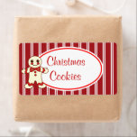 Etiketter för julkakor fraktsedel<br><div class="desc">En söt julkaka/pepparkaksgubbe och candy cane färgad rand dekorerar denna julkaketikett. Använda etiketterna för julkakor,  snacks,  mattor,  presenter osv..Anpassa etiketten till kostym efter dina behov,  lägg till,  ta bort eller ändra texten. Formgivningarna kommer från originalteckningen.</div>