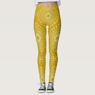 Etniskt geometriskt mönster: guldfärgad gult, vit leggings