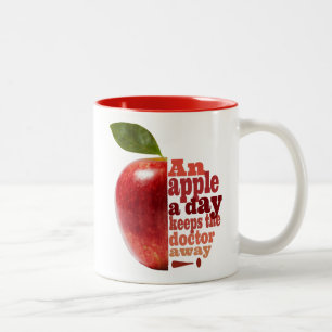 Ett äpple per dag Två-Tonad mugg