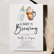 Ett Baby håller på att blåsa babyskor för Flaska-k